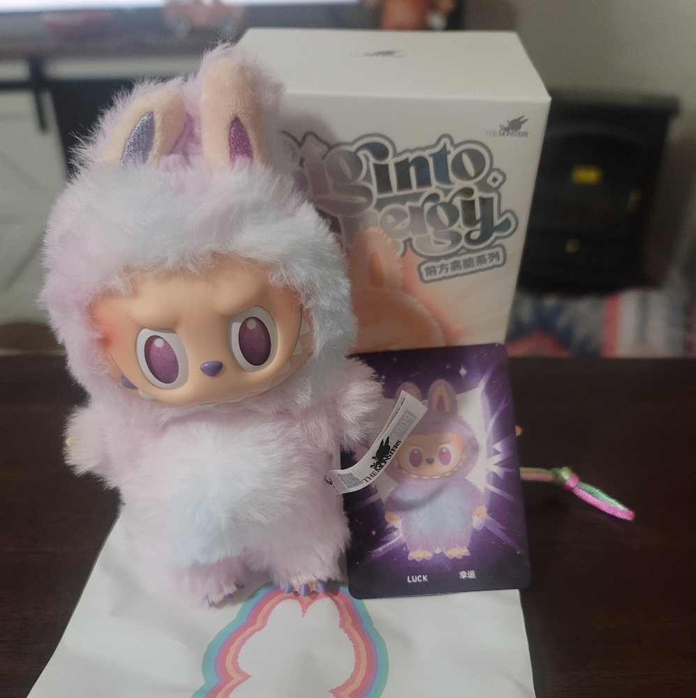 Purple and White Plush Toy
